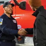 Technician shaking hands 
